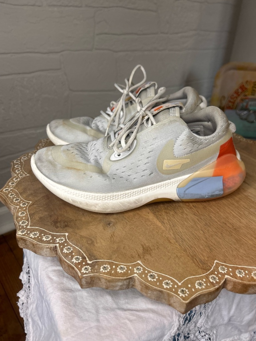 Nike Women's Light Gray Sneakers with Orange & Blue Accents- Joyride
